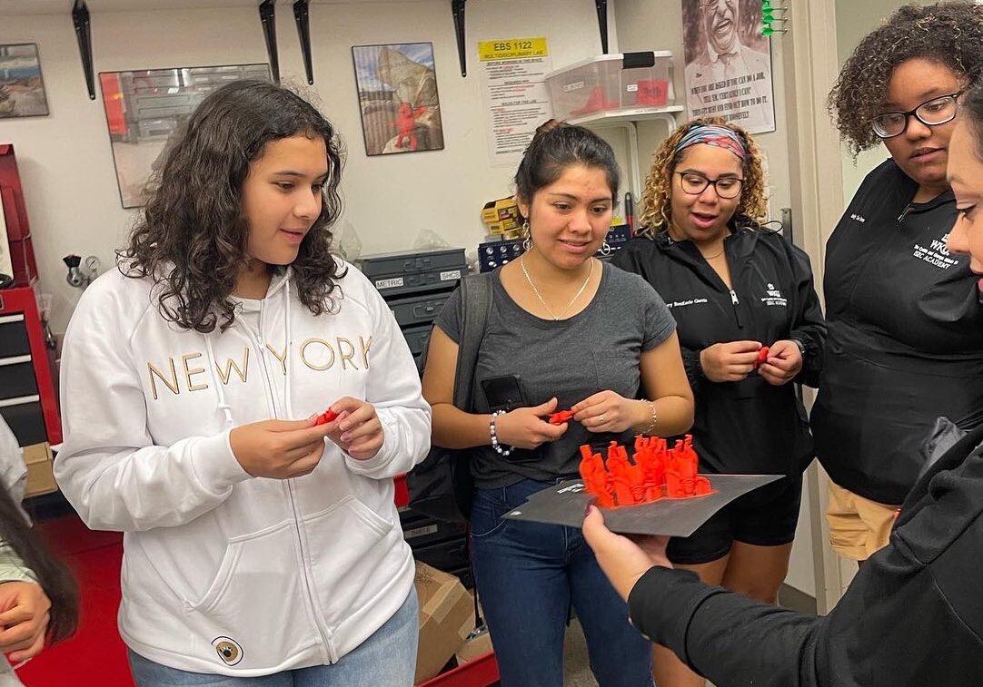 students looking at engineering project